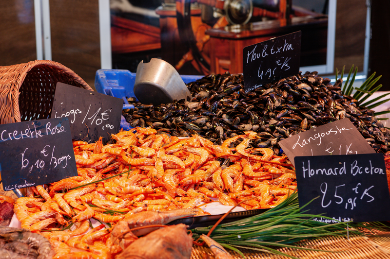 Fresh prawns, mussels, lobsters at farmer's market in Bordeaux, France