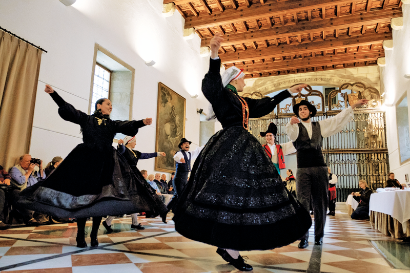 Galicean dancers perform for guests in Santiago de Compostela, Spain