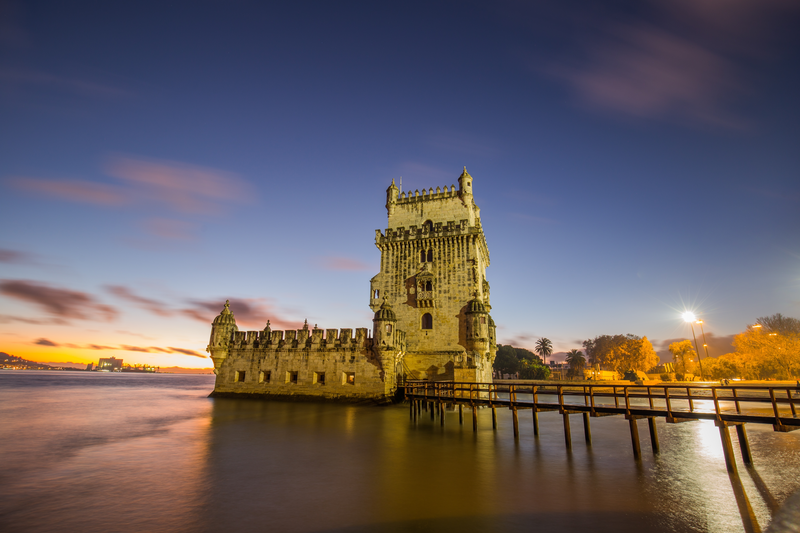 Evening sunset city view of the Belém Tower on Tagus River, Lisbon, Portugal 