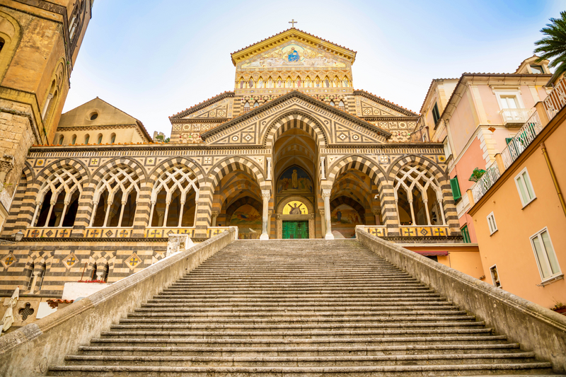 View of main entrance to Cathedral of St Andrea and the steps leading to it, Amalfi in Italy
