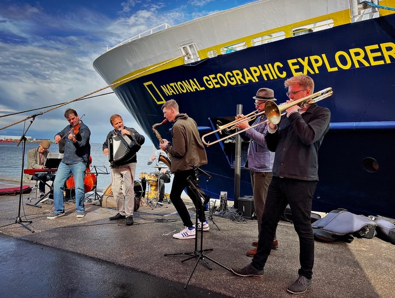 The Habadekuk Band playing music by the ship National Geographic Explorer in Copenhagen