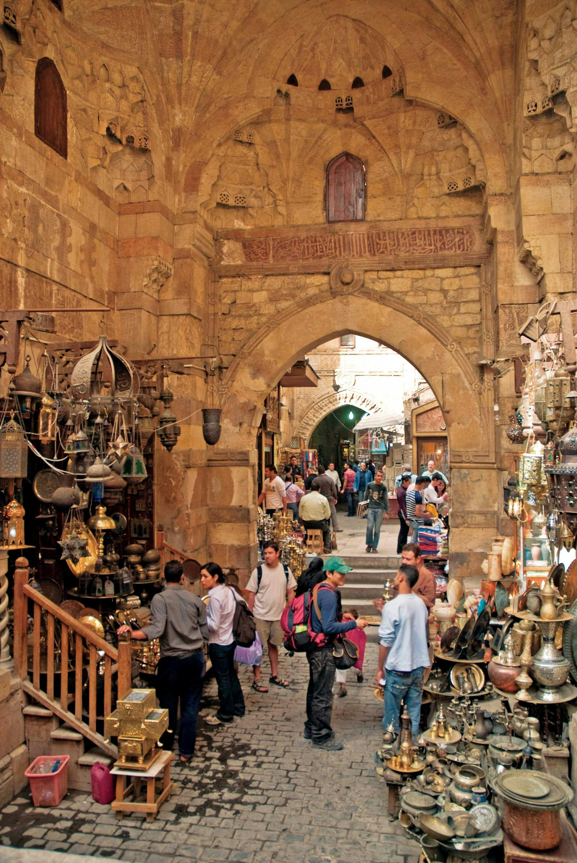Guests explore Khan el-Khalili the famous bazaar and souq in the historic center of Cairo, Egypt.