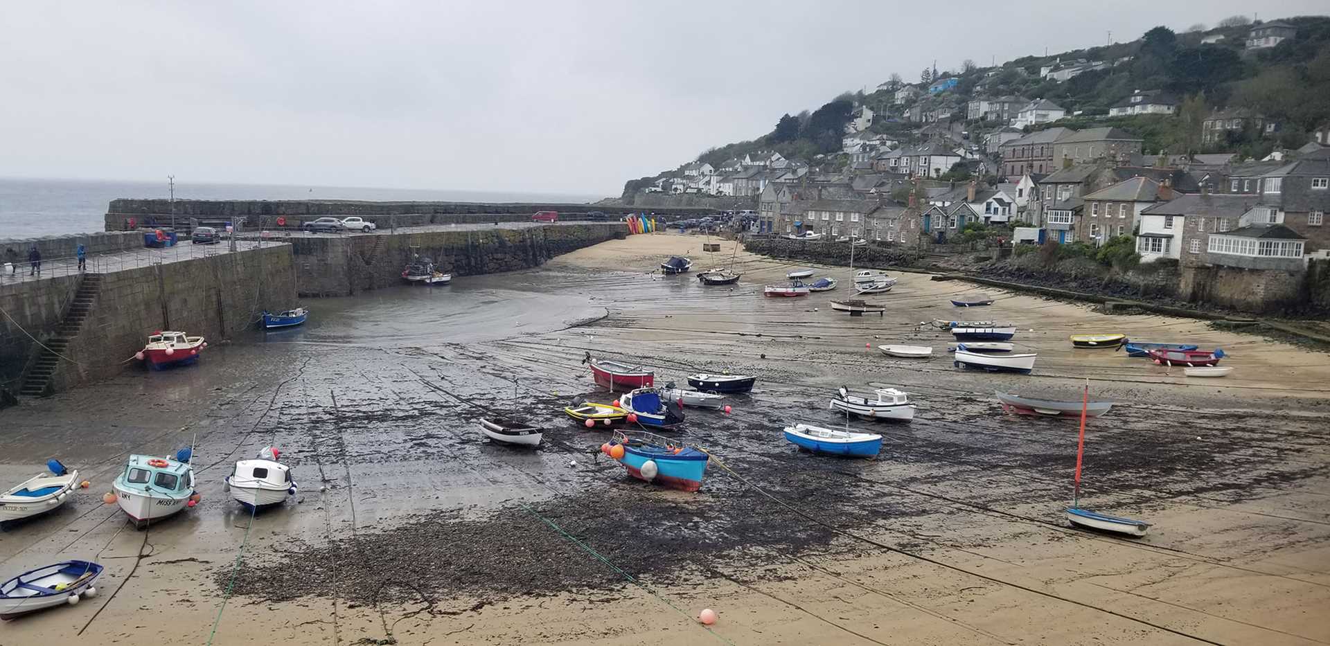 small boats at low tide