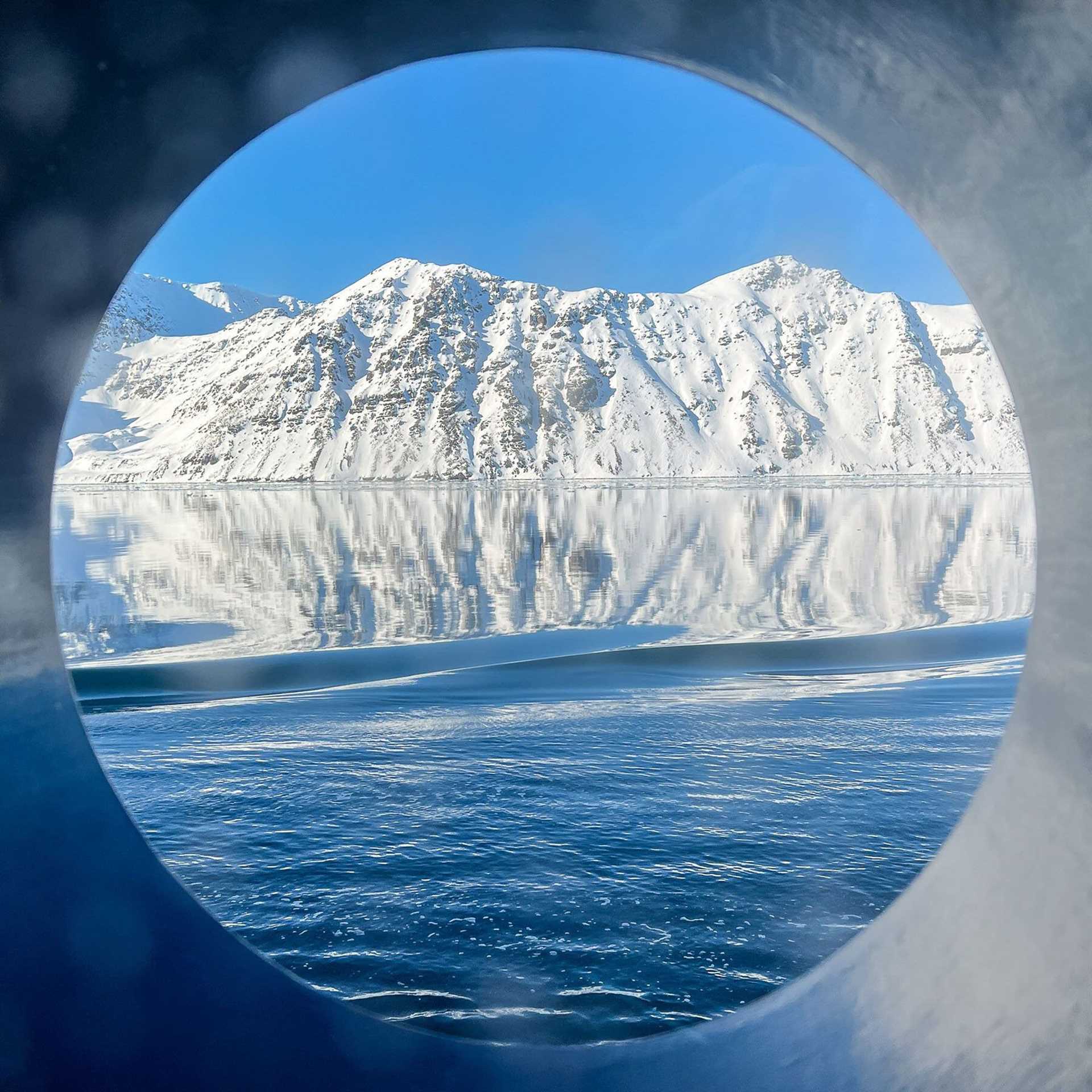 view of ice through a porthole