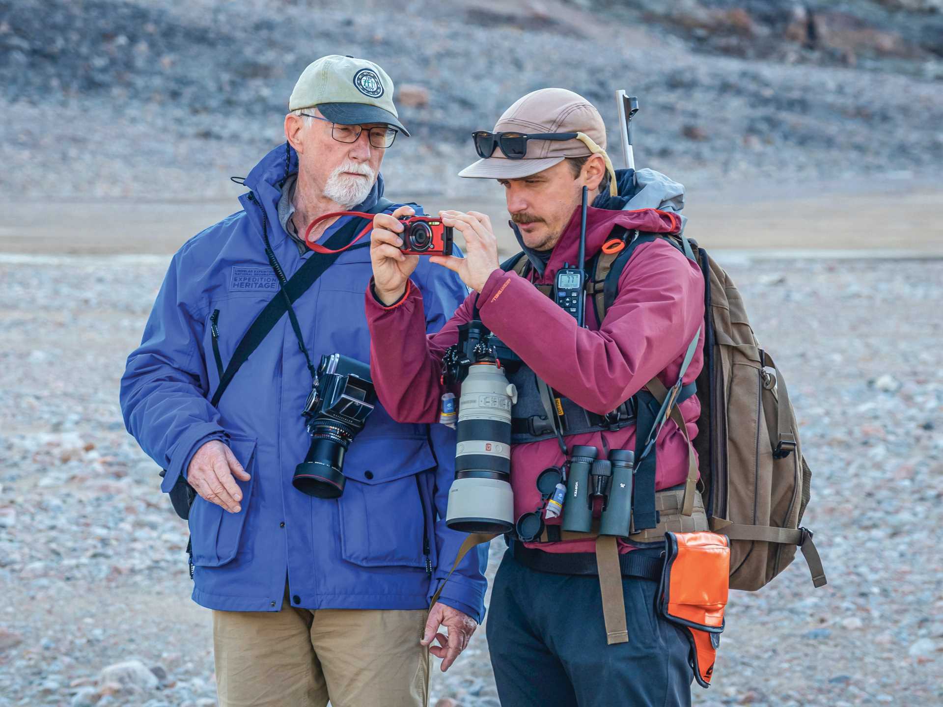 A staff member talks to a guest in Greenland