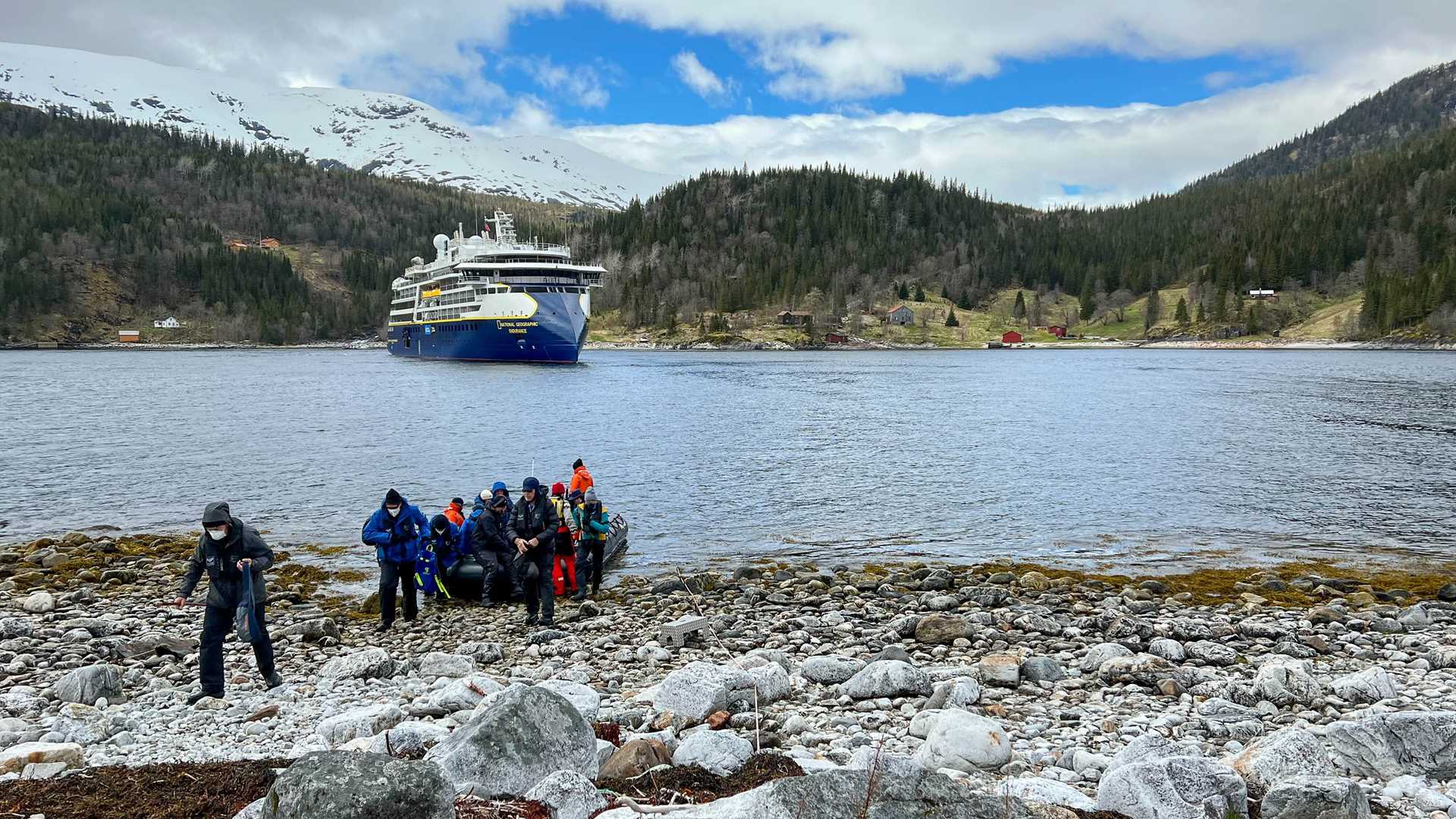 Guests disembarking a Zodiac in Svalbard, Norway