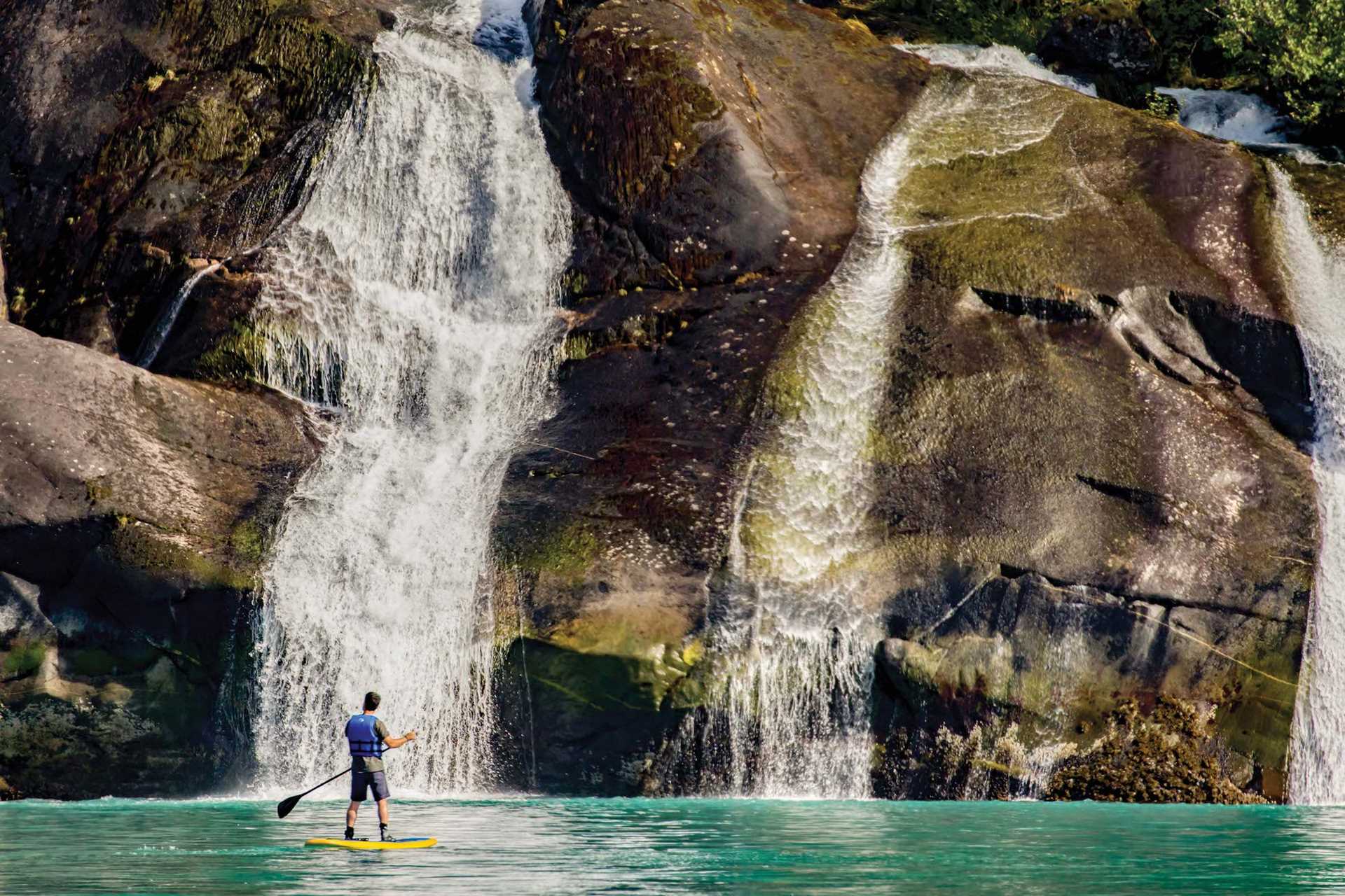 Paddleboarding Past a Waterfall.jpg