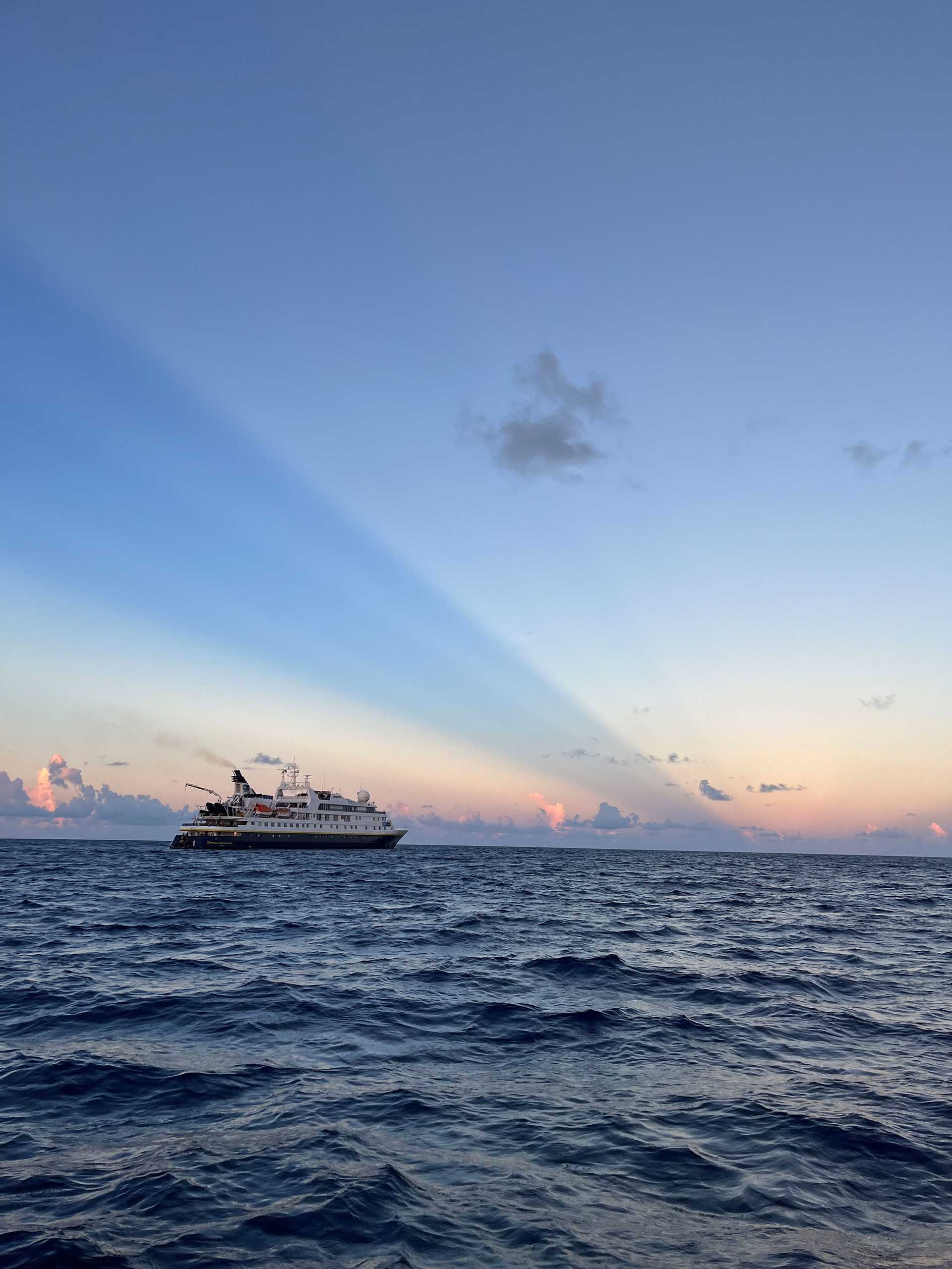 antecrepuscular rays over a ship